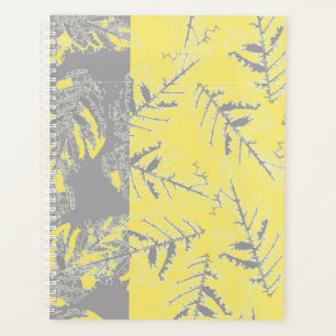 Grey and yellow leaves on a striped background. planner