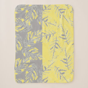 Grey and yellow leaves on a striped background. sherpa blanket