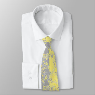 Grey and yellow leaves on a striped background.  tie