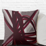 Grey & Burgundy Modern Artistic Abstract Cushion<br><div class="desc">Grey and burgundy throw pillow features a stylish artistic ribbon design with shades of grey white and burgundy on a grey background. This abstract composition is built on combinations of repeated organic ribbons, which are overlapped and interlaced to form an interesting artistic design. The grey, burgundy, white and wine coloured...</div>