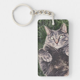 grey cat lying in the grass Acrylic Keychain
