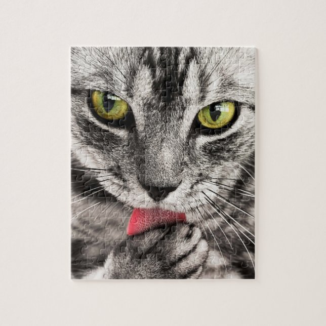 Grey Cat with Yellow Eyes Licking Paw Jigsaw Puzzle (Vertical)