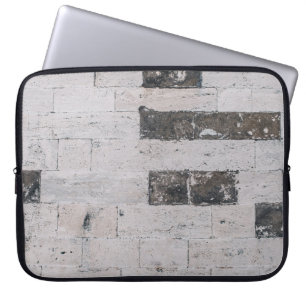 Grey cement wall laptop sleeve
