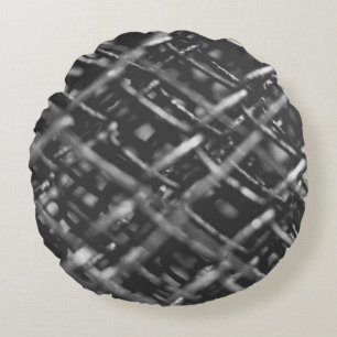 Grey chain link fence round cushion