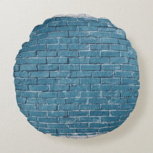 Grey concrete bricks painted in blue round cushion