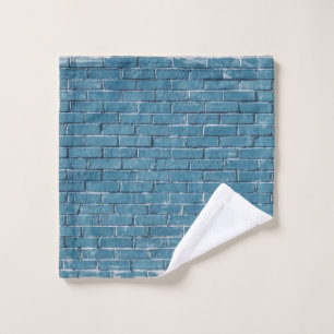 Grey concrete bricks painted in blue wash cloth