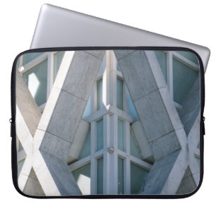 Grey concrete building at daytime laptop sleeve