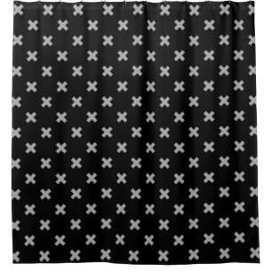 Grey cross stitches on black shower curtain