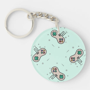 Grey game joystick on blue key ring
