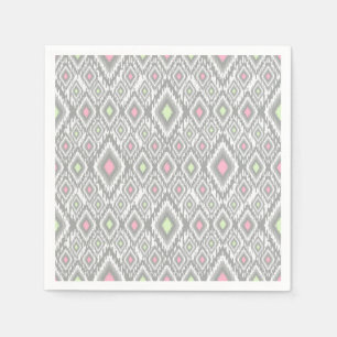 Grey, green, pink rhombuses on a white napkin