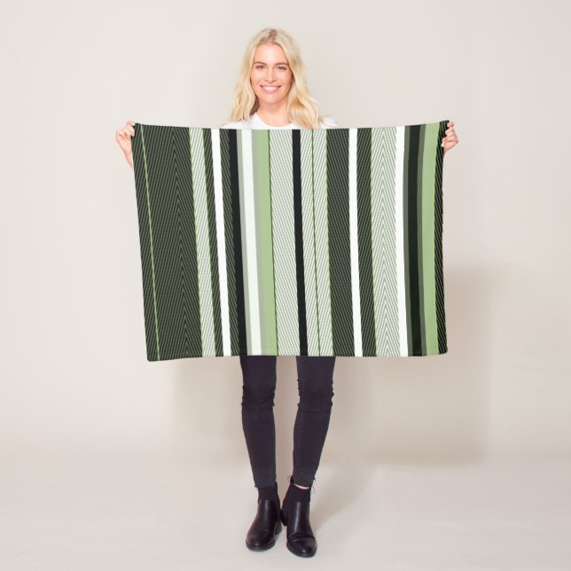 Grey, green, white stripes.  fleece blanket (In Situ)