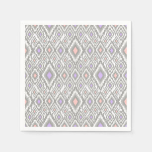 Grey, lilac, coral, diamonds on a white napkin