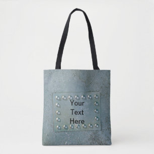 Grey metal with text plate on tote bag