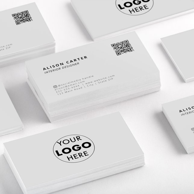 Grey Modern Business Cards | QR & Logo | Stand Out (Stacks of off white business cards showing the front of the card with QR code and logo at the back.)