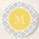 Grey Quatrefoil Pattern, Yellow Monogram Coaster<br><div class="desc">Trendy, stylish, grey or grey and white quatrefoil pattern you can personalise with a white monogram initial in a modern font, on a yellow circle label, banner, frame with white circular lines border. GraphicsByMimi© A trendy pattern for her. Use the template field to add your monogram initial or letter or...</div>