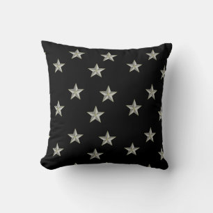 grey stars on black cushion