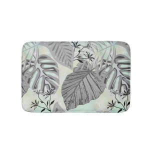 Grey tropical leaves and flowers. bath mat
