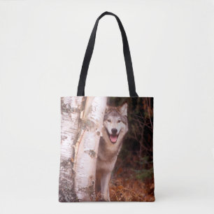 Grey Wolf Behind a Tree Tote Bag
