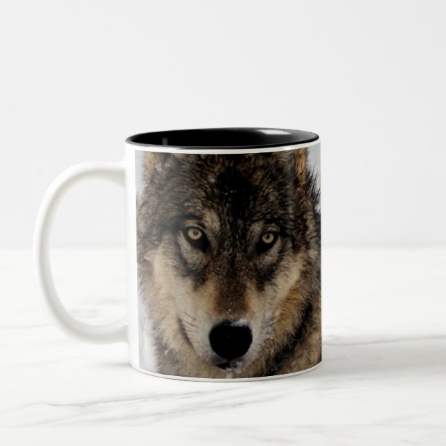 Grey Wolf or Timber Wolf Laying in the Snow Two-Tone Coffee Mug (Left)