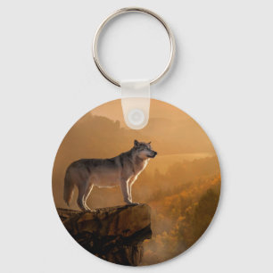 Grey wolf standing on a rock in the forest key ring