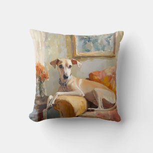 Greyhound on a sofa cushion