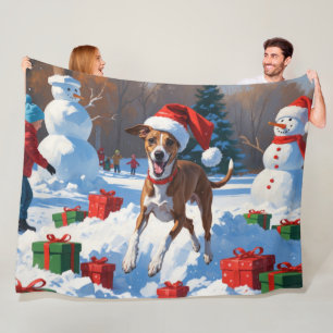 Greyhound Running in Snow with Christmas Hat Fleece Blanket