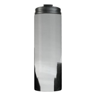 GREYSCALE PHOTO OF PATHWAY BETWEEN BUILDINGS THERMAL TUMBLER