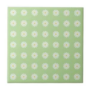 Grid pattern of tiny daisies on light green ceramic tile