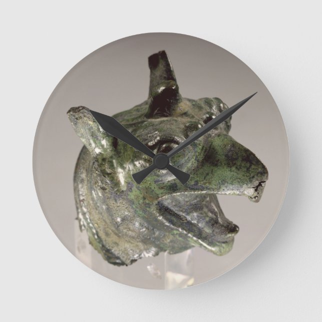 Griffin head, fragment of a cauldron attachment, f round clock (Front)