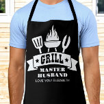 Grill Master Husband Black Apron<br><div class="desc">Custom Christmas,  wedding anniversary or birthday gift for your husband,  this black apron features illustrations of a barbecue grill and "Grill Master Husband" in fun typography.</div>
