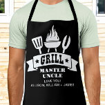 Grill Master Uncle Black Apron<br><div class="desc">Unique custom black apron for a favourite uncle on Christmas, Father's Day or his birthday featuring illustrations of a barbecue grill and "Grill Master Uncle" in fun white typography. Add the names of his nieces and nephews. If needed, edit in the design tool to increase or decrease the font size...</div>