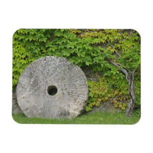 Grinding stone, Castle Banfi in Tuscany region, Magnet