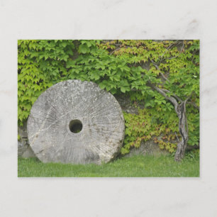 Grinding stone, Castle Banfi in Tuscany region, Postcard