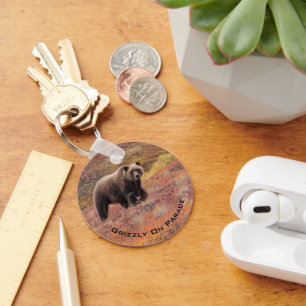 Grizzly Bear Moves Through Autumn Colours In Key Ring