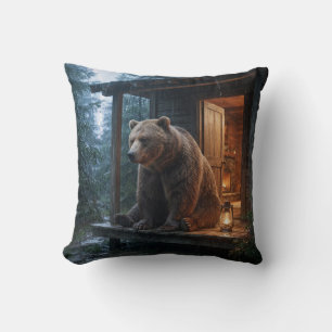 Grizzly Bear Sitting on Porch of Cosy Cabin Cushion