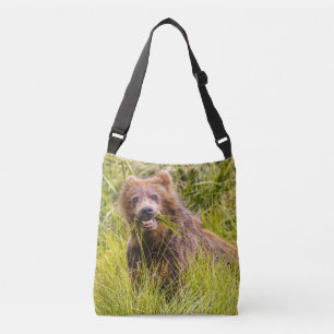 Grizzly cub grazing, Alaska Crossbody Bag