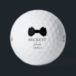 Groom Black Bow Tie Golf Balls<br><div class="desc">These golf balls are a great favour for the groom. If all your wedding party will be wearing suits with bow ties this design with a traditional double bow tie in black would be perfect. They'd be great for a bachelor party or weekend. The job title can be changed to...</div>