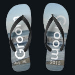 Groom Ocean Waves Beach Sand Thongs<br><div class="desc">Pretty Blue Sky with Light Fluffy White Clouds, Blue Sea, Crashing Ocean Waves and Beach Sand. Unisex Flip Flops with Groom and Date of Marriage written in a white colour text. PERSONALIZE with your Wedding DATE (or delete text). The wedding date is written in the sand. Shown with Wide Black...</div>