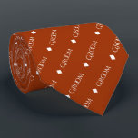 Groom - Repeating White Text on Rust Orange Tie<br><div class="desc">This fun neck tie is the perfect accessory for the groom at your wedding. It features a simple yet elegant design with the word "Groom" written in a decorative all capital white font, and repeating in a diagonal pattern with diamond separators on a rust orange or burnt umber coloured background....</div>