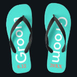 Groom Turquoise Thongs<br><div class="desc">Groom is written in white text against bright turquoise blue with black accents.  Personalise with date of wedding in coral. Cool beach destination or honeymoon flip flops. Original designs by TamiraZDesigns.</div>