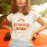 Groovy Bride Name Retro 70s Bachelorette Party T-Shirt<br><div class="desc">Celebrate your bachelorette with this super fun t-shirt,  featuring groovy typography,  daisy flowers,  custom date,  location & elegant calligraphy name. Easily add your own details by clicking on the "personalise" option.</div>