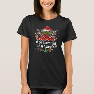 Groovy Christmas Most Likely to get their tinsel i T-Shirt