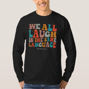 Groovy We All Laugh In The Same Language ESL Teach T-Shirt