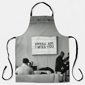 GROUP OF PEOPLE SITTING ON CHAIR APRON