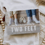 Growing By Two Feet Pregnancy Announcement<br><div class="desc">Share a cute photo of your shoes next to a pair of baby shoes with this adorable pregnancy announcement. Full bleed photo card features "our family is growing by two feet" as a white text overlay along the bottom. Personalise with your names and baby's expected arrival date beneath. Cards reverse...</div>