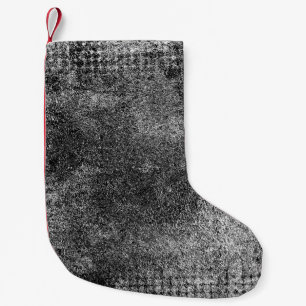 Grunge background of black and whiteabstract, aged small christmas stocking