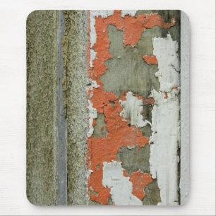 Grunge peeling orange paint on concrete wall mouse pad
