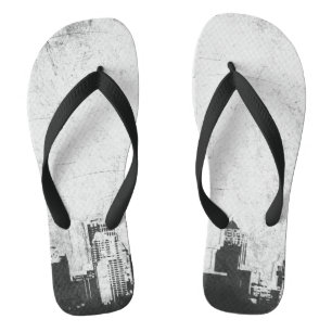 Grungy city background in black and white thongs