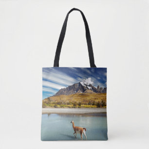 Guanaco crossing the river in Torres del Paine Tote Bag