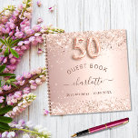 Guest book 50th birthday rose gold glitter blush<br><div class="desc">A guestbook for a feminine and glamorous 50th birthday party.  A stylish rose gold faux metallic looking background with faux glitter sparkles. Add your name,  text.</div>